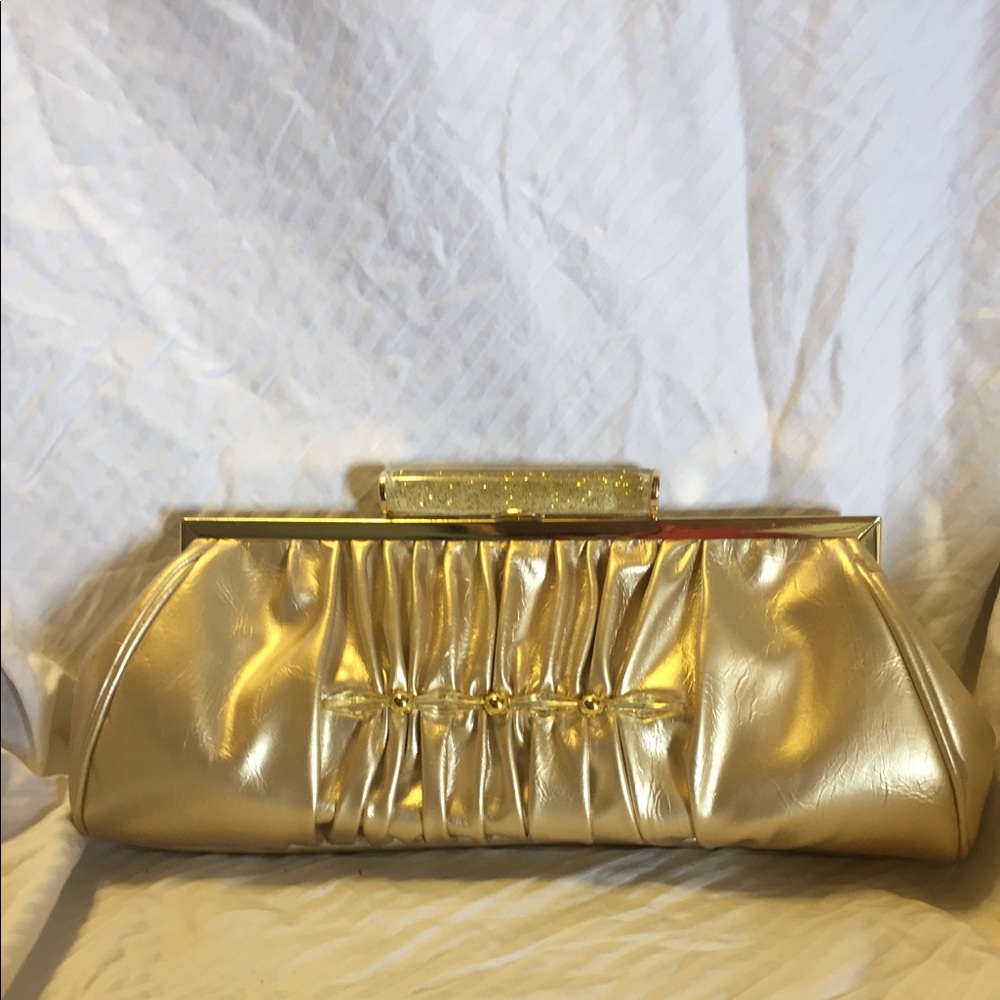 Vintage gold leather clutch handbag